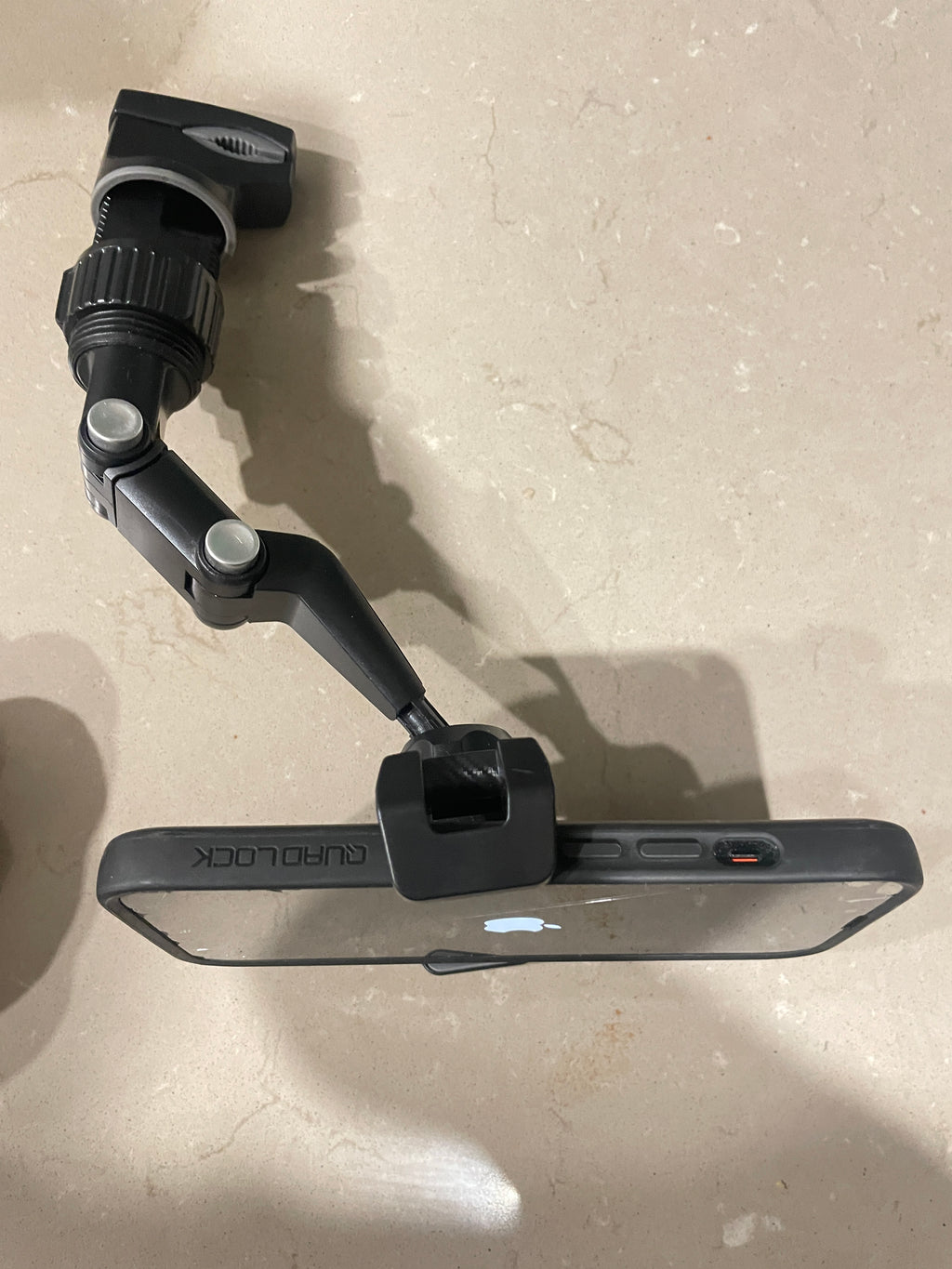 QENTROVA universal phone holder for car, motorcycle, bike, and desk, securely holding smartphones in various positions.