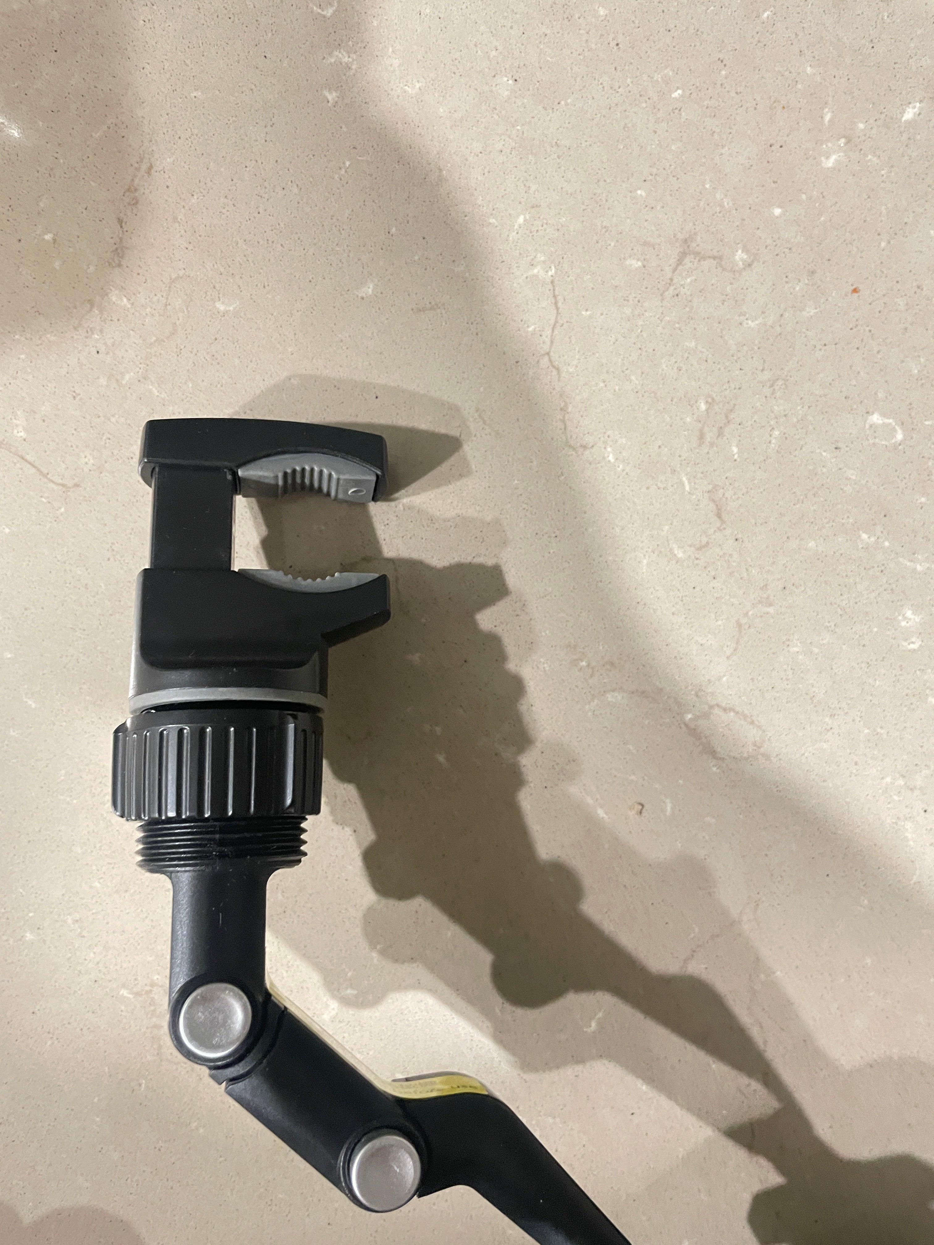 QENTROVA universal phone holder for car, motorcycle, bike, and desk, showing adjustable mount securing a smartphone.